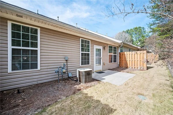 a view of a back yard of the house