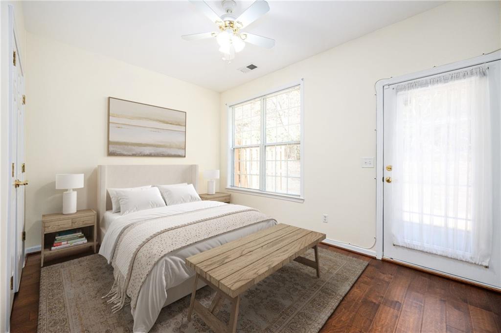 248 Riverstone Place Canton, GA 30114 - Photo 8 of 29 a bedroom with a bed and a window