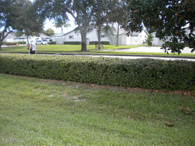 1948 Quail Ridge Court, Unit 904 Cocoa, FL 32926 - Photo 16 of 19 rear view