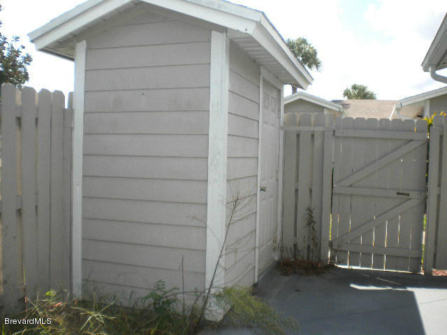 1948 Quail Ridge Court, Unit 904 Cocoa, FL 32926 - Photo 19 of 19 storage shed