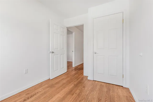 a view of a kitchen from the hallway