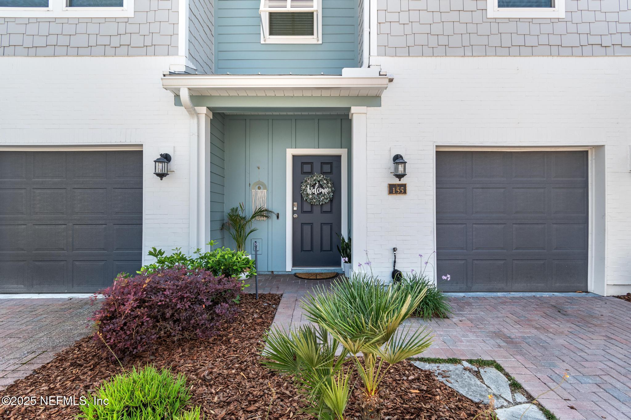 155 Appleton Court St. Augustine, FL 32092 - Photo 1 of 56 a front view of a house with a yard