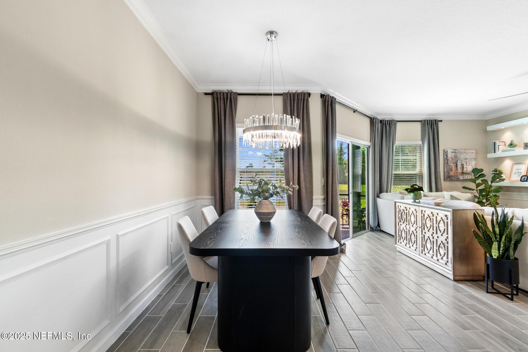 155 Appleton Court St. Augustine, FL 32092 - Photo 12 of 56 a view of a dining room with furniture window and wooden floor