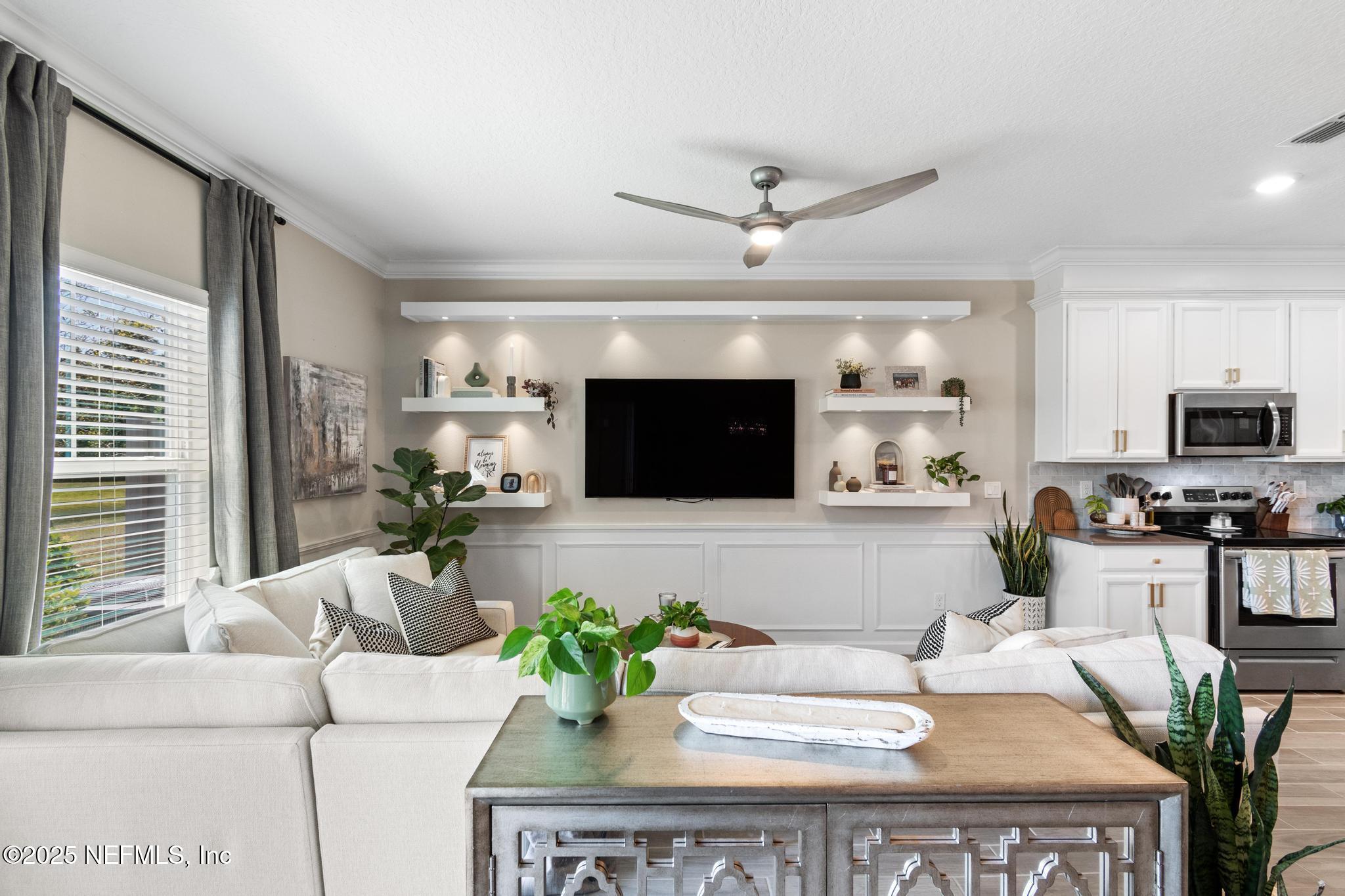 155 Appleton Court St. Augustine, FL 32092 - Photo 17 of 56 a living room with furniture and a flat screen tv