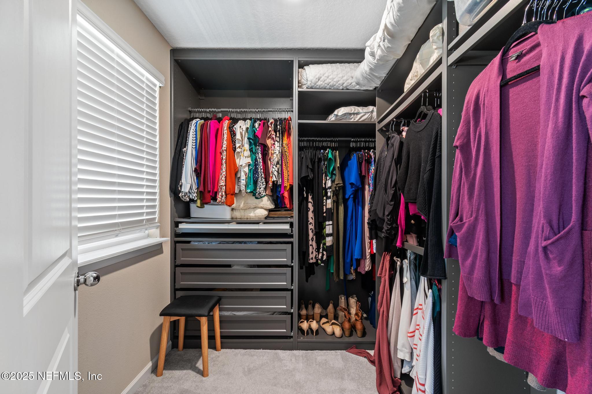 155 Appleton Court St. Augustine, FL 32092 - Photo 31 of 56 a view of walk in closet with clothes
