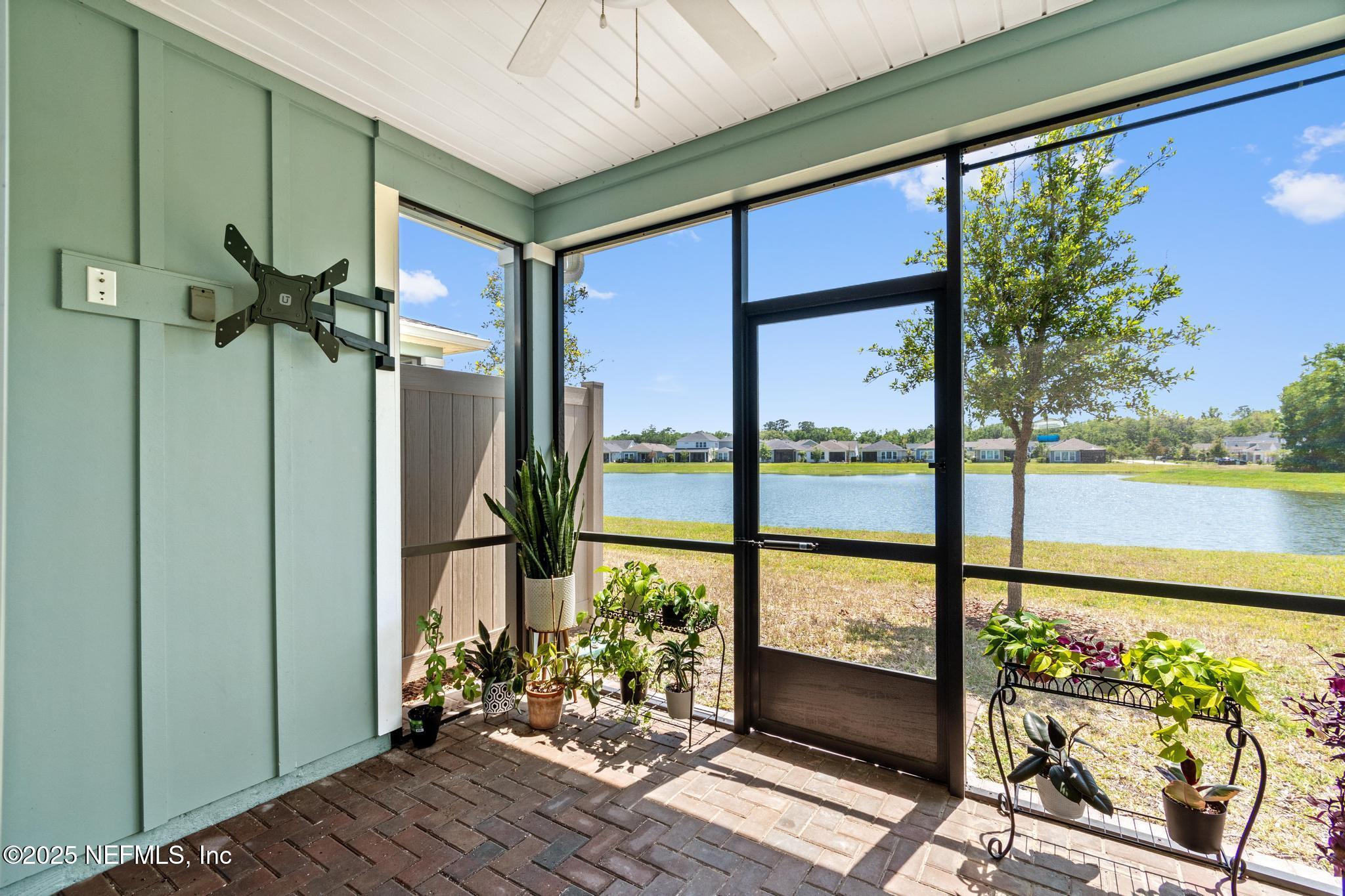 155 Appleton Court St. Augustine, FL 32092 - Photo 35 of 56 a view of a living room and floor to ceiling window