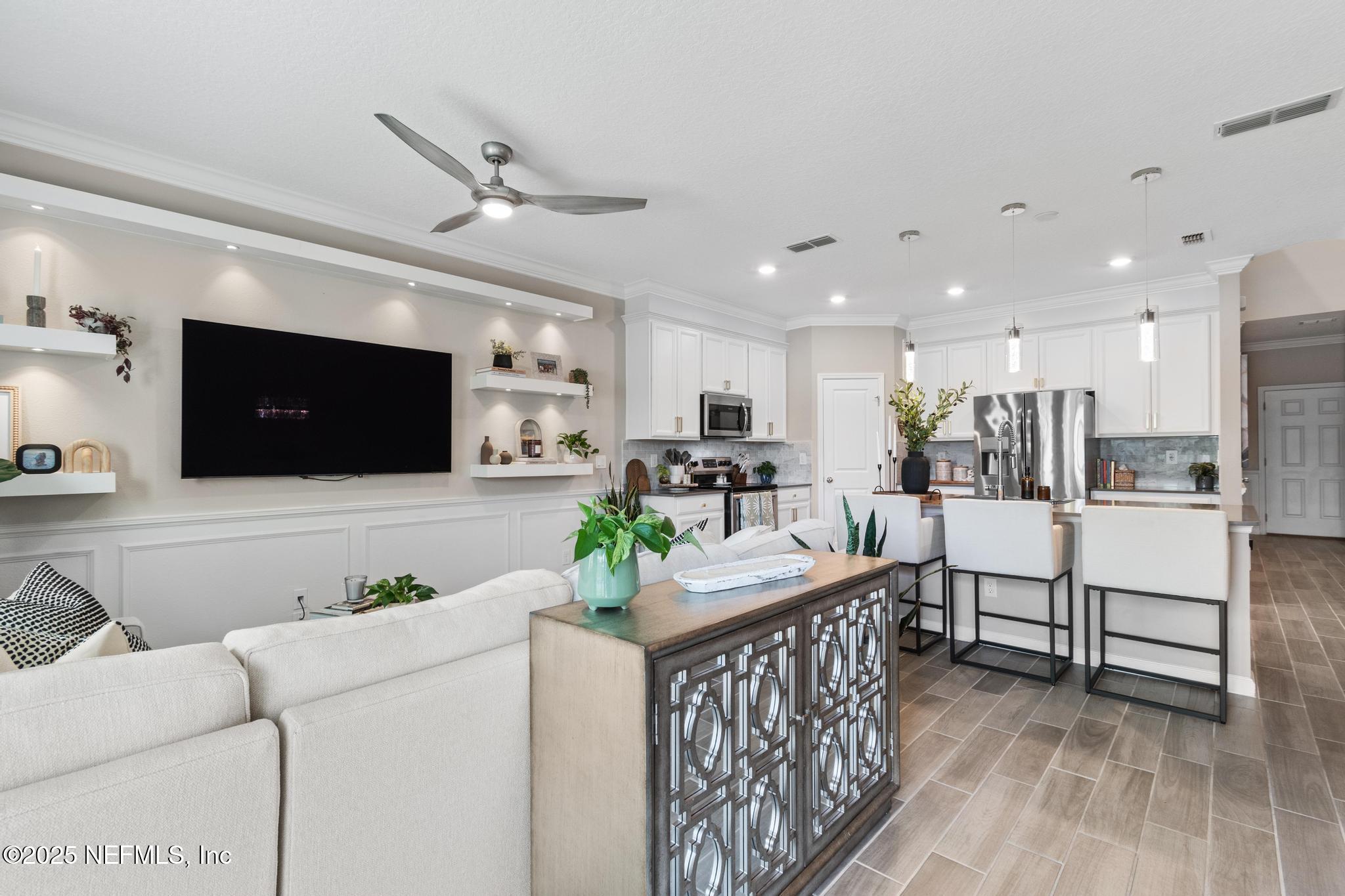 155 Appleton Court St. Augustine, FL 32092 - Photo 5 of 56 a living room with furniture and a flat screen tv