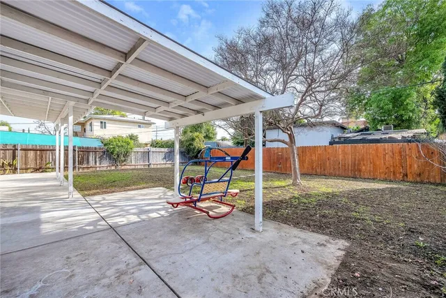 a view of a backyard with a slide