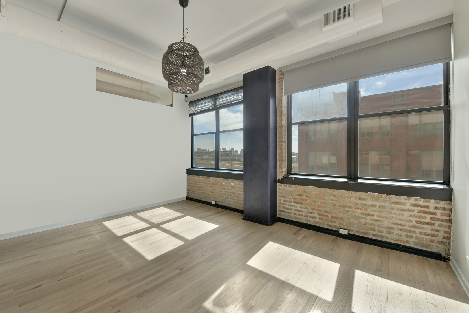 812 West Van Buren Street, Unit 5A Chicago, IL 60607 - Photo 11 of 26 a view of an empty room with a window
