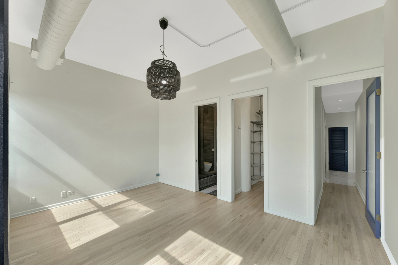 812 West Van Buren Street, Unit 5A Chicago, IL 60607 - Photo 13 of 26 a view of a room with wooden floor and hallway