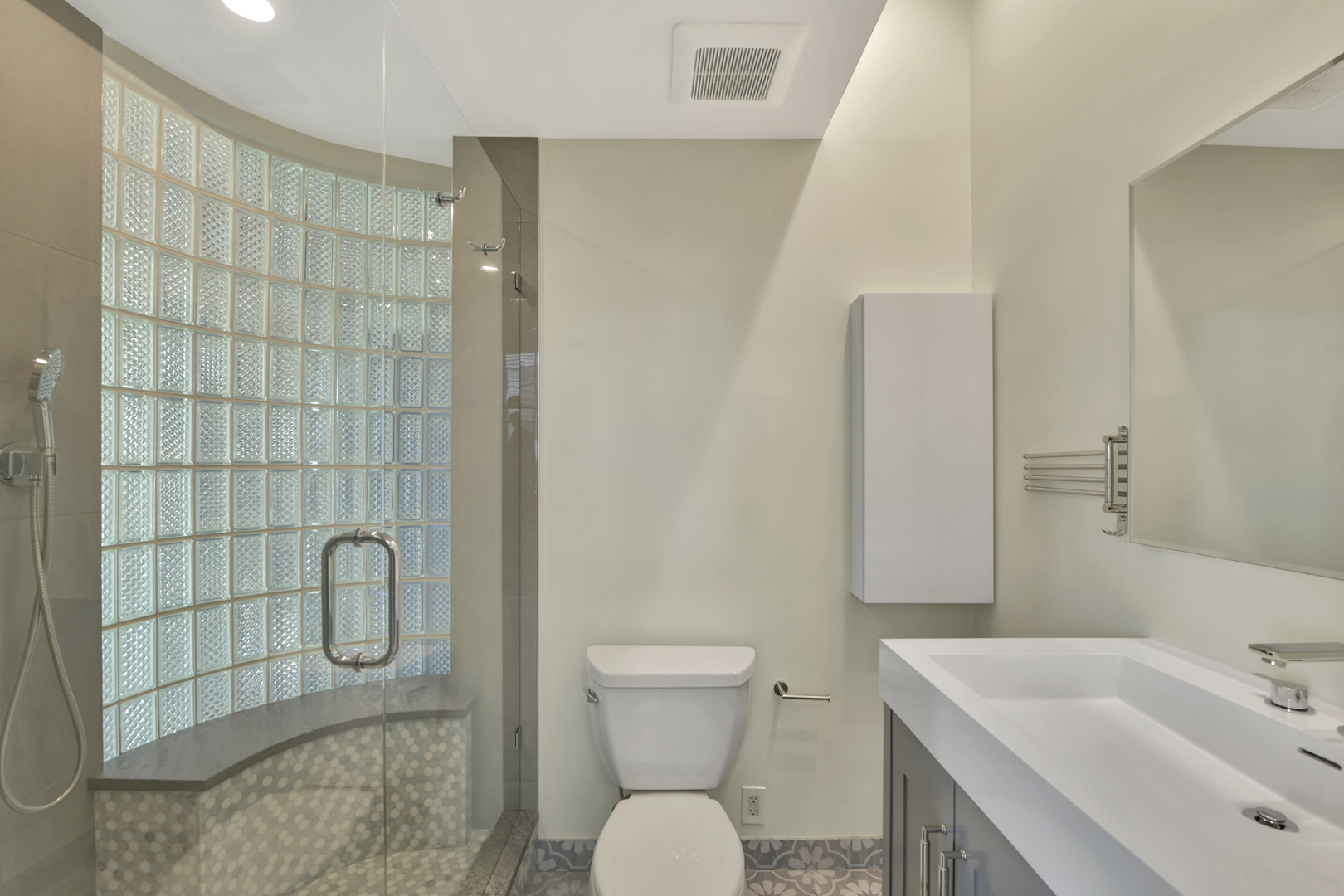 812 West Van Buren Street, Unit 5A Chicago, IL 60607 - Photo 19 of 26 a bathroom with a sink toilet and shower