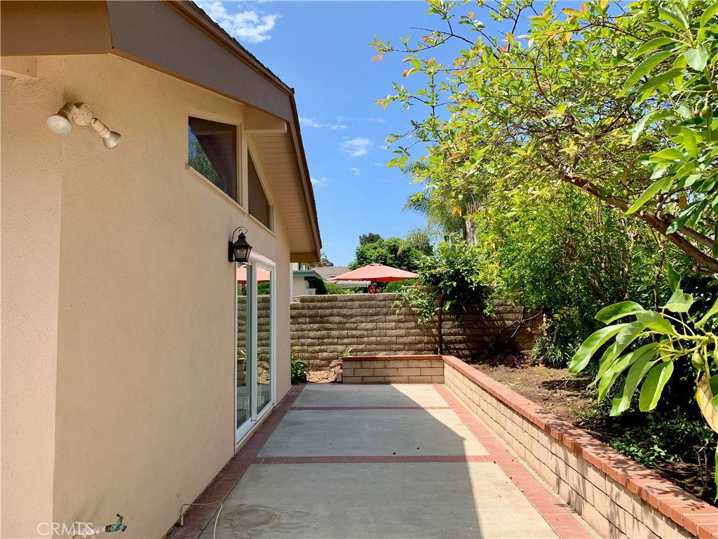 15 Butler Street Irvine, CA 92612 - Photo 35 of 37 a path view of a house with a yard