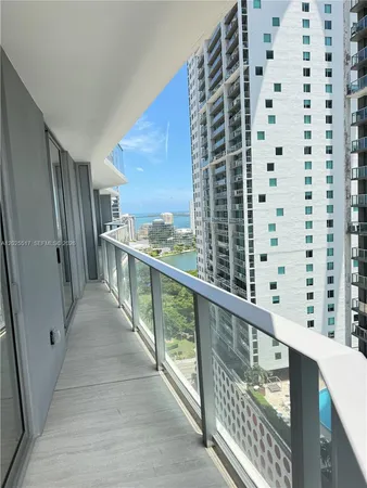 a view of balcony with furniture