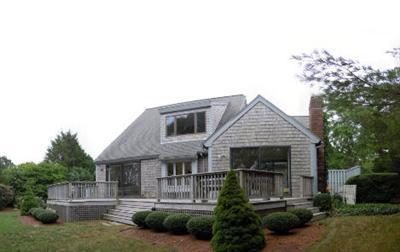 208 Huckins Neck Road Centerville, MA 02601 - Photo 12 of 12 a front view of a house with garden