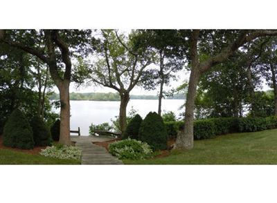 208 Huckins Neck Road Centerville, MA 02601 - Photo 2 of 12 a view of an outdoor space with mountain view