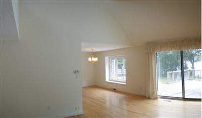 208 Huckins Neck Road Centerville, MA 02601 - Photo 7 of 12 an empty room with windows