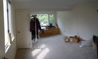 208 Huckins Neck Road Centerville, MA 02601 - Photo 10 of 12 a room with gym equipment and a large window