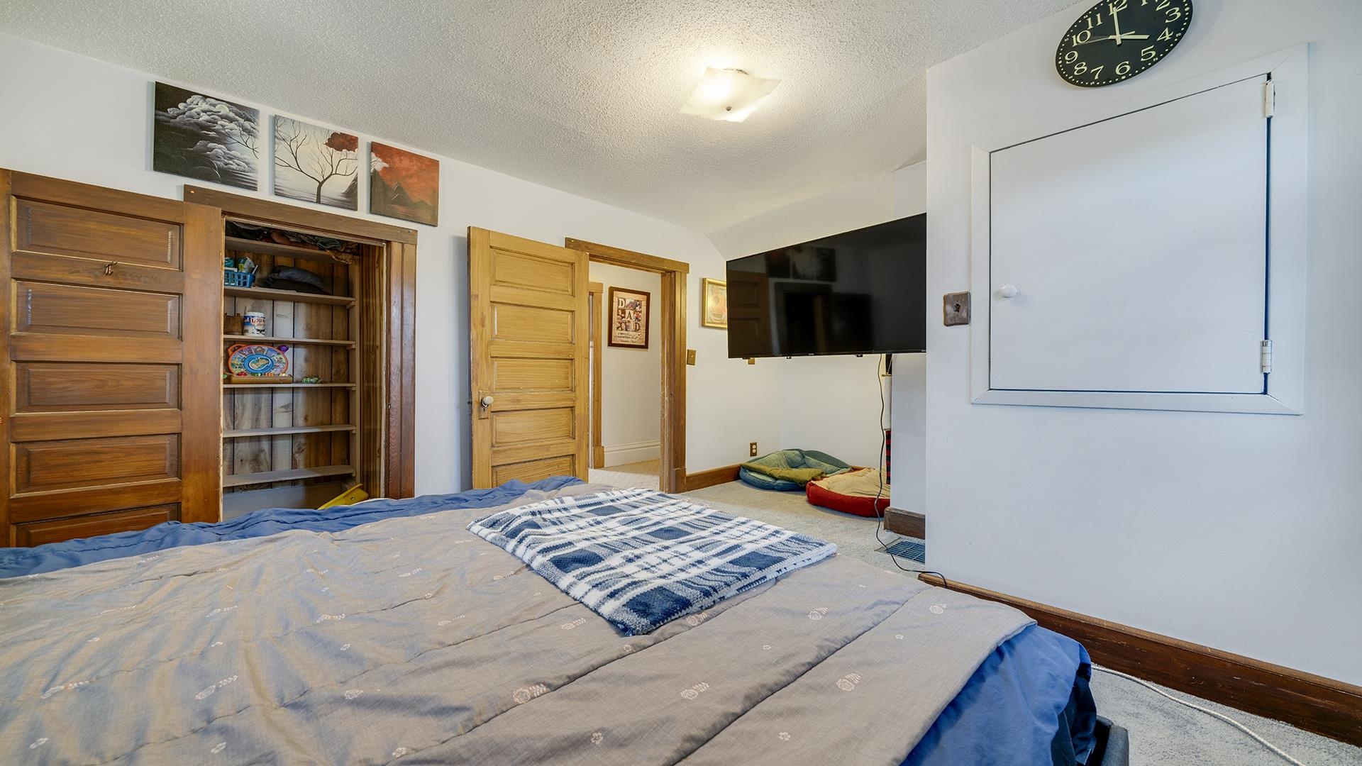 4738 Owen Center Road Rockford, IL 61101 - Photo 12 of 42 a bedroom with a bed and a television