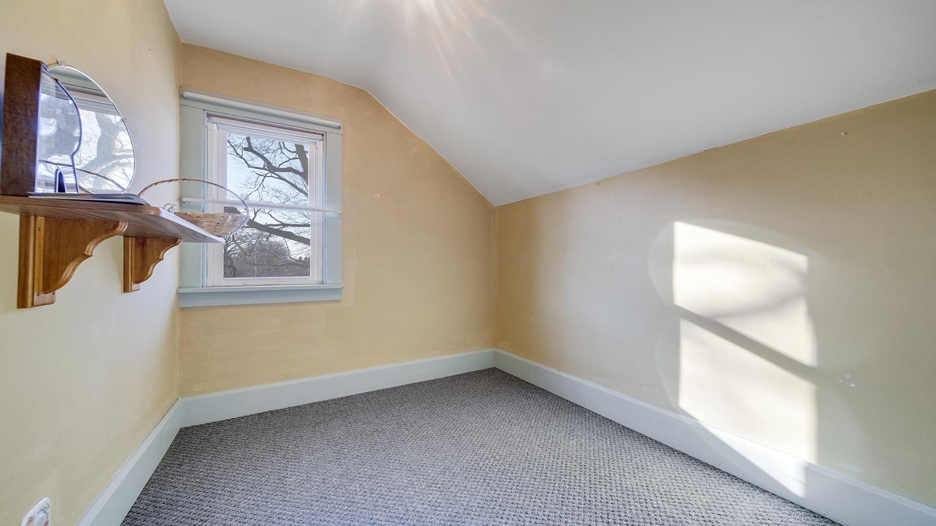 4738 Owen Center Road Rockford, IL 61101 - Photo 16 of 42 a view of an empty room with a window