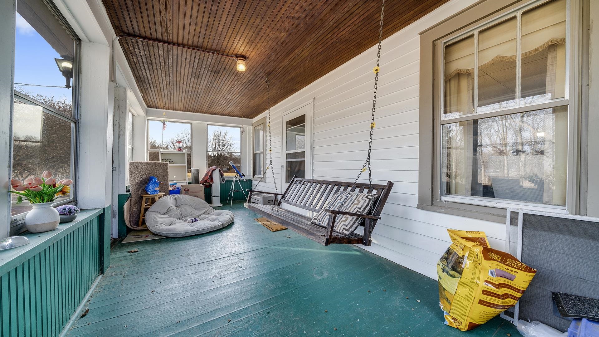 4738 Owen Center Road Rockford, IL 61101 - Photo 19 of 42 a bedroom with furniture and a large window