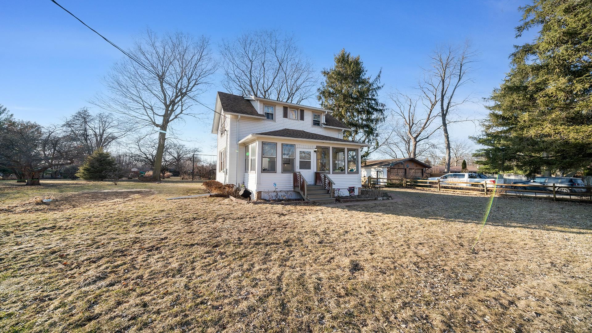 4738 Owen Center Road Rockford, IL 61101 - Photo 24 of 42 a view of a house with a yard covered in snow