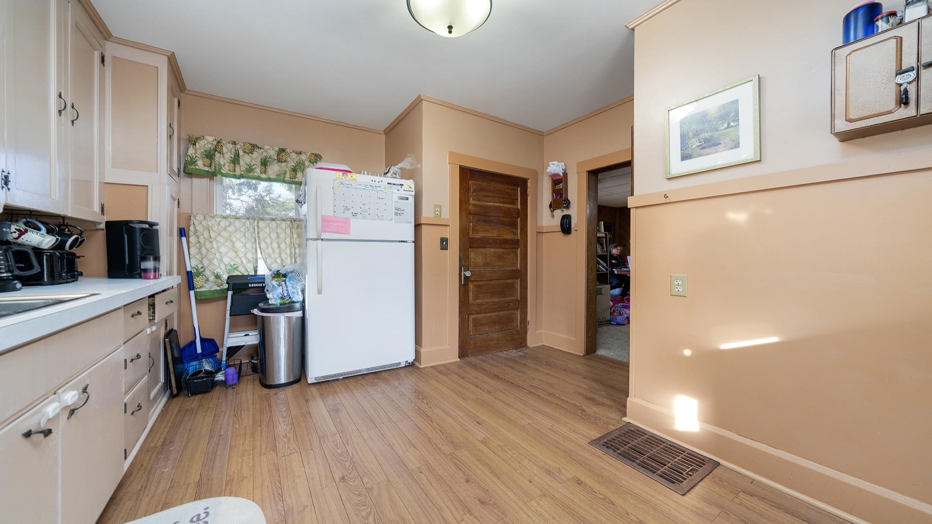 4738 Owen Center Road Rockford, IL 61101 - Photo 4 of 42 a view of a kitchen from the hallway