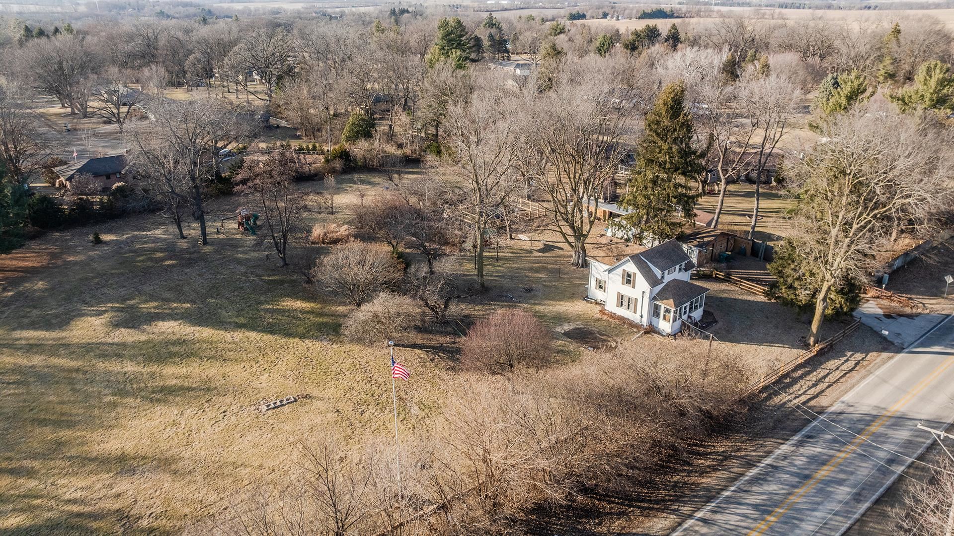 4738 Owen Center Road Rockford, IL 61101 - Photo 42 of 42 a view of a yard with cars parked