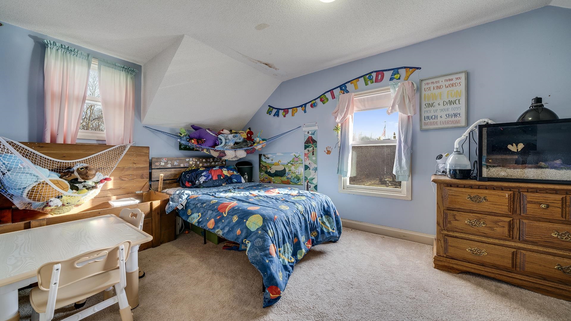 4738 Owen Center Road Rockford, IL 61101 - Photo 10 of 42 a bedroom with a bed and wooden floor