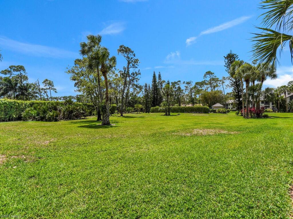 5825 Rattlesnake Hammock Road, Unit 202 Naples, FL 34113 - Photo 25 of 30 a view of a golf course