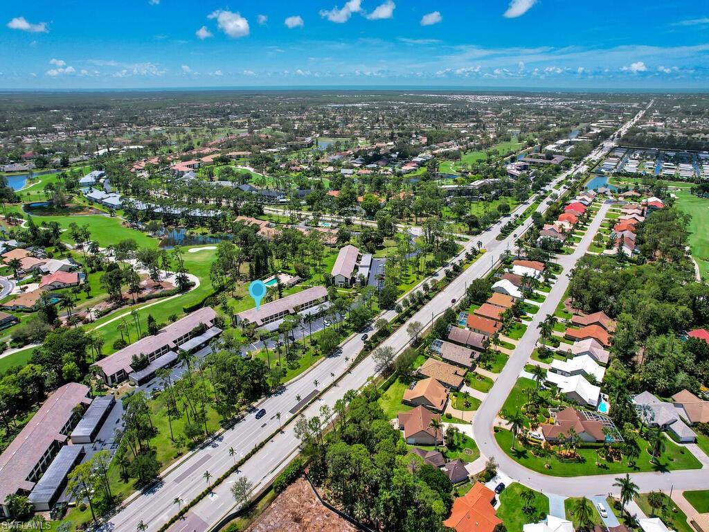 5825 Rattlesnake Hammock Road, Unit 202 Naples, FL 34113 - Photo 29 of 30 an aerial view of city and lake