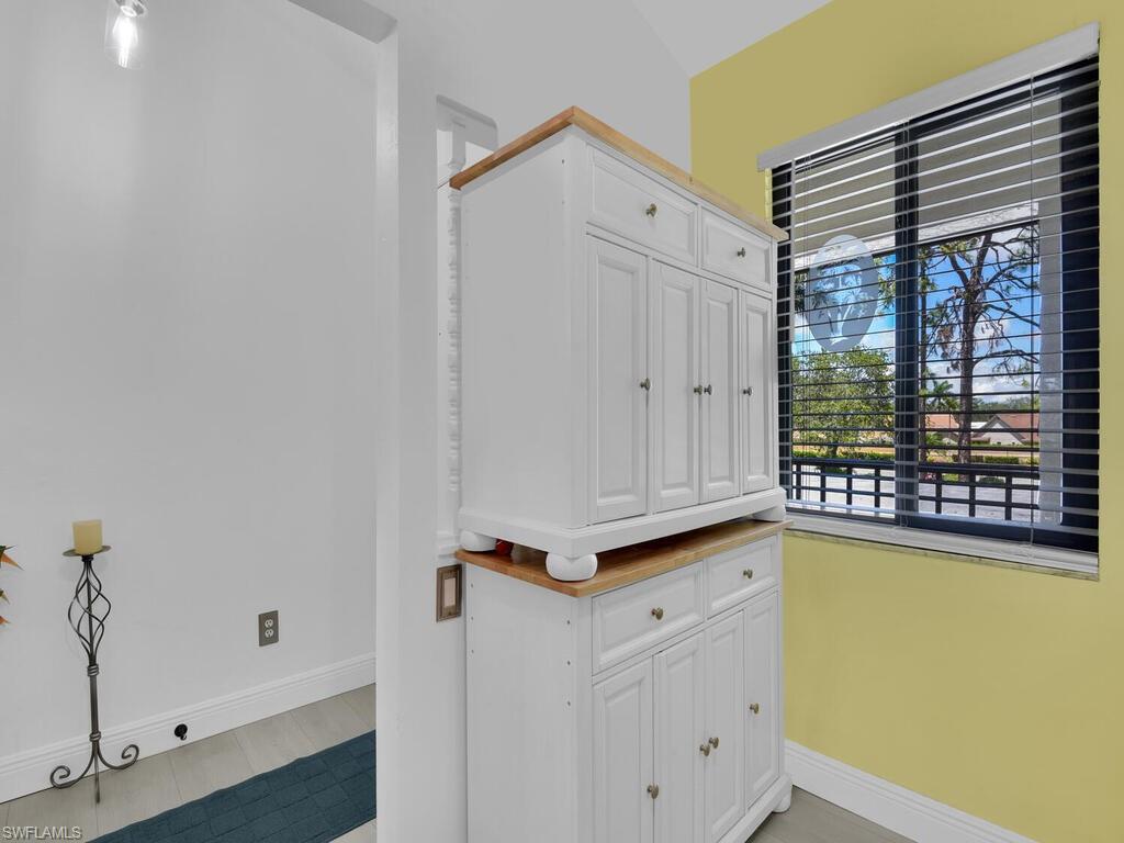 5825 Rattlesnake Hammock Road, Unit 202 Naples, FL 34113 - Photo 10 of 30 a view of a storage & utility room