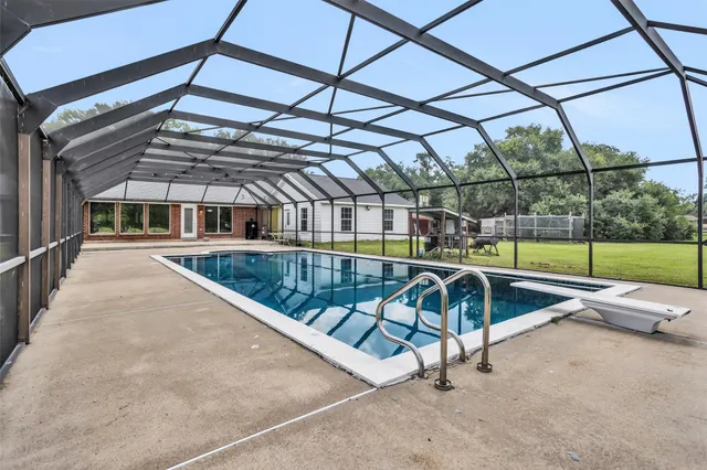 a view of outdoor space with swimming pool