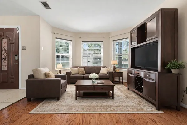 a view of entryway and hall with a front door