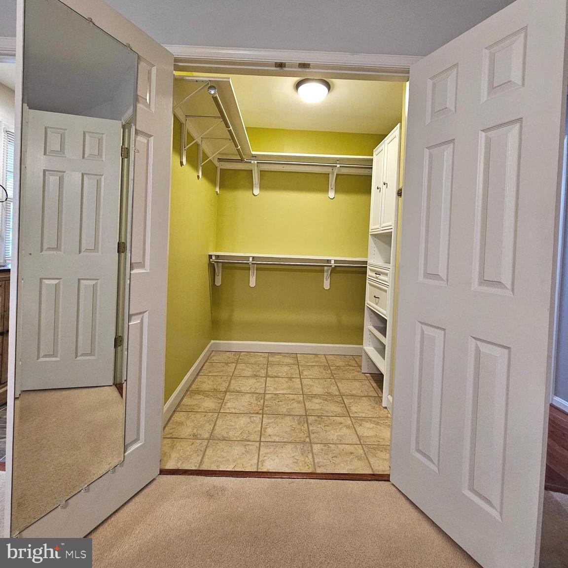 7777 Turlock Road Springfield, VA 22153 - Photo 17 of 43 a bathroom with a tub shower and vanity