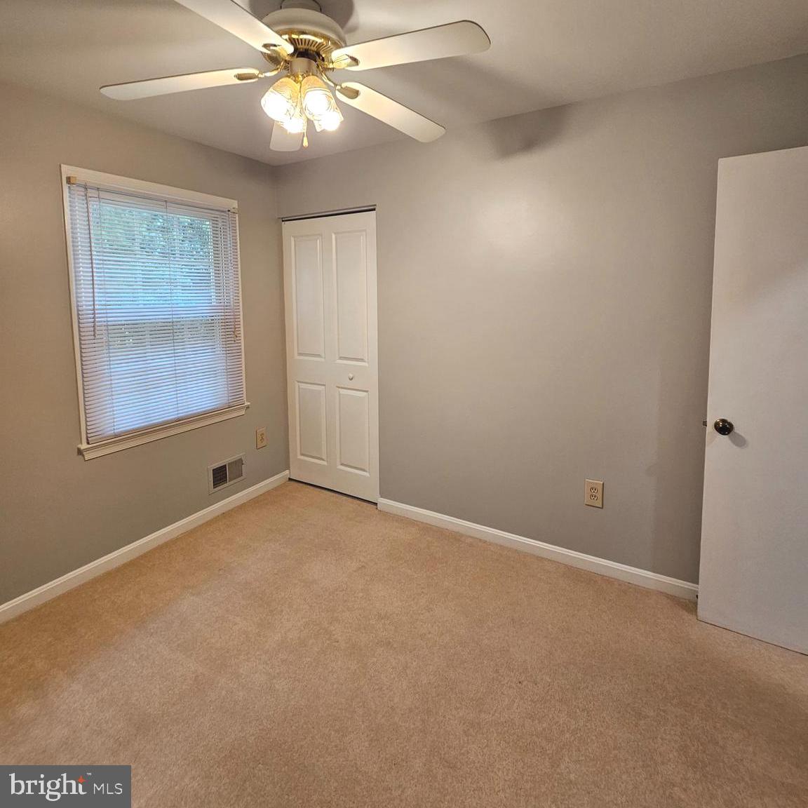 7777 Turlock Road Springfield, VA 22153 - Photo 21 of 43 a view of an empty room with a window