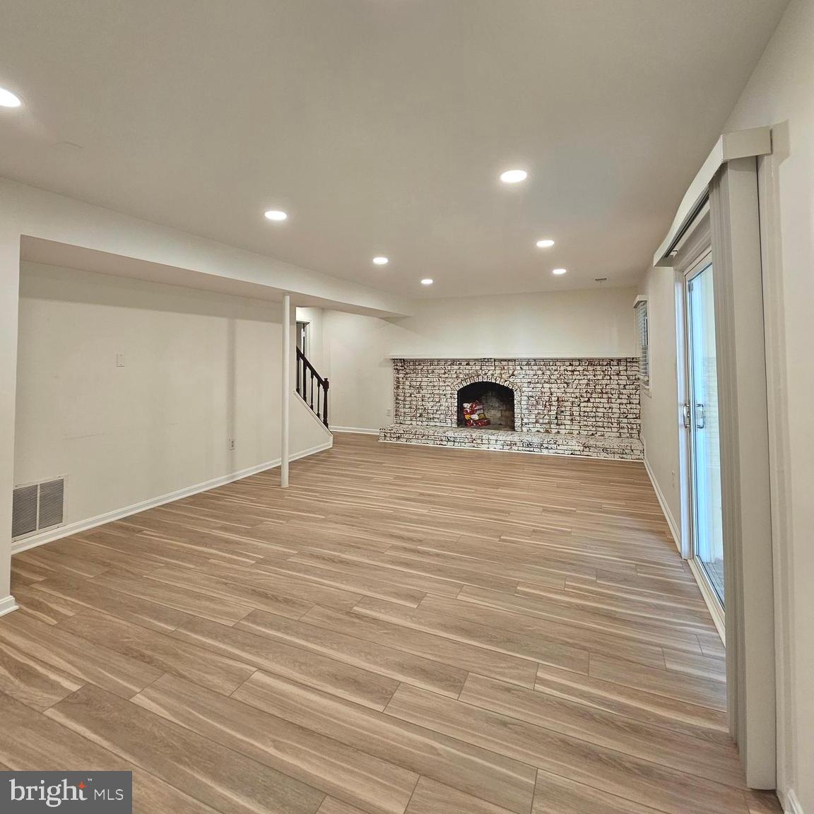 7777 Turlock Road Springfield, VA 22153 - Photo 24 of 43 a view of empty room with wooden floor