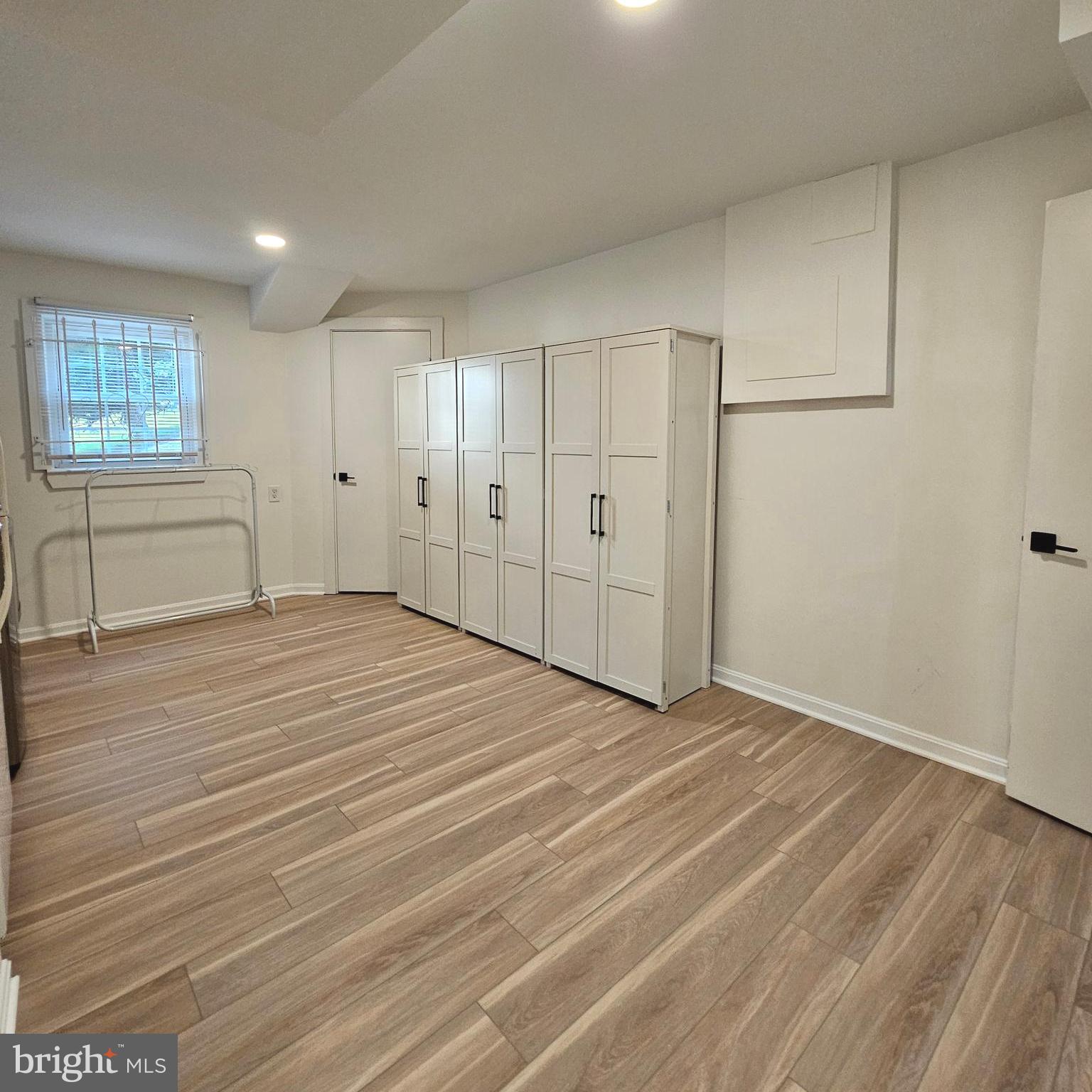 7777 Turlock Road Springfield, VA 22153 - Photo 29 of 43 a big room with wooden floor and window