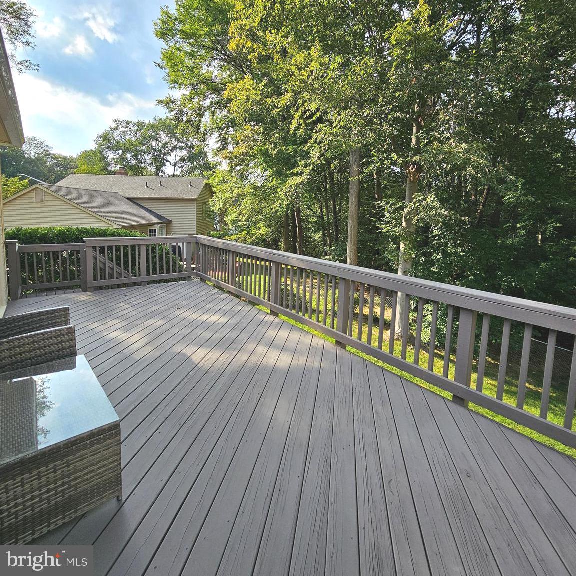 7777 Turlock Road Springfield, VA 22153 - Photo 36 of 43 a view of balcony with wooden floor and fence