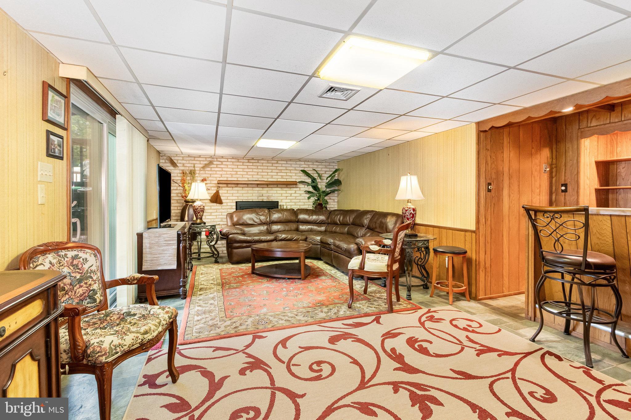 414 Trudy Road Harrisburg, PA 17109 - Photo 18 of 26 a view of a dining room with furniture and a chandelier