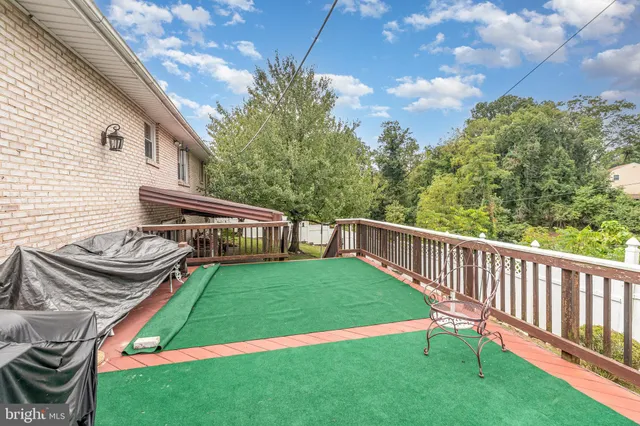 a view of a back yard of the house