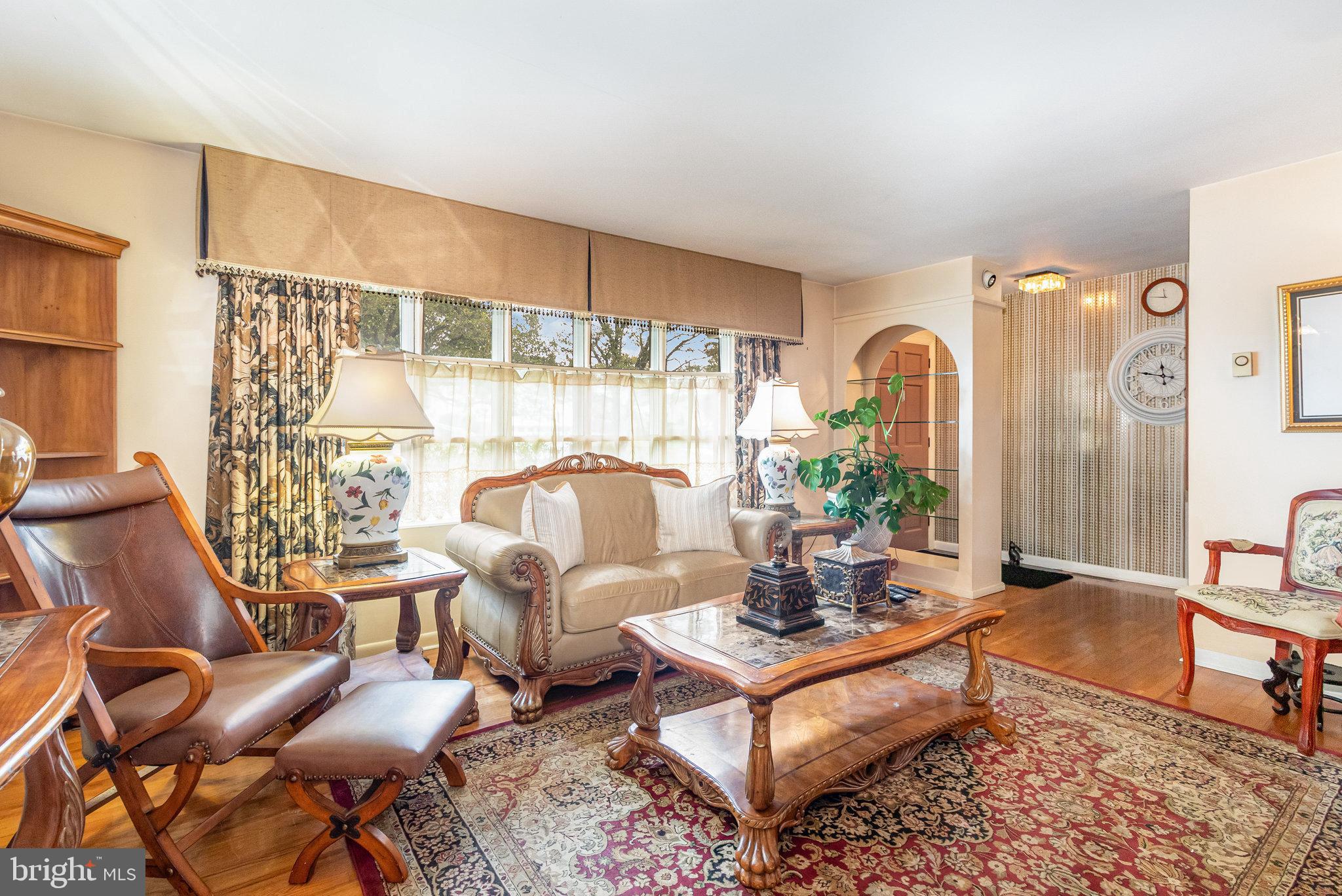 414 Trudy Road Harrisburg, PA 17109 - Photo 5 of 26 a living room with furniture and a large window