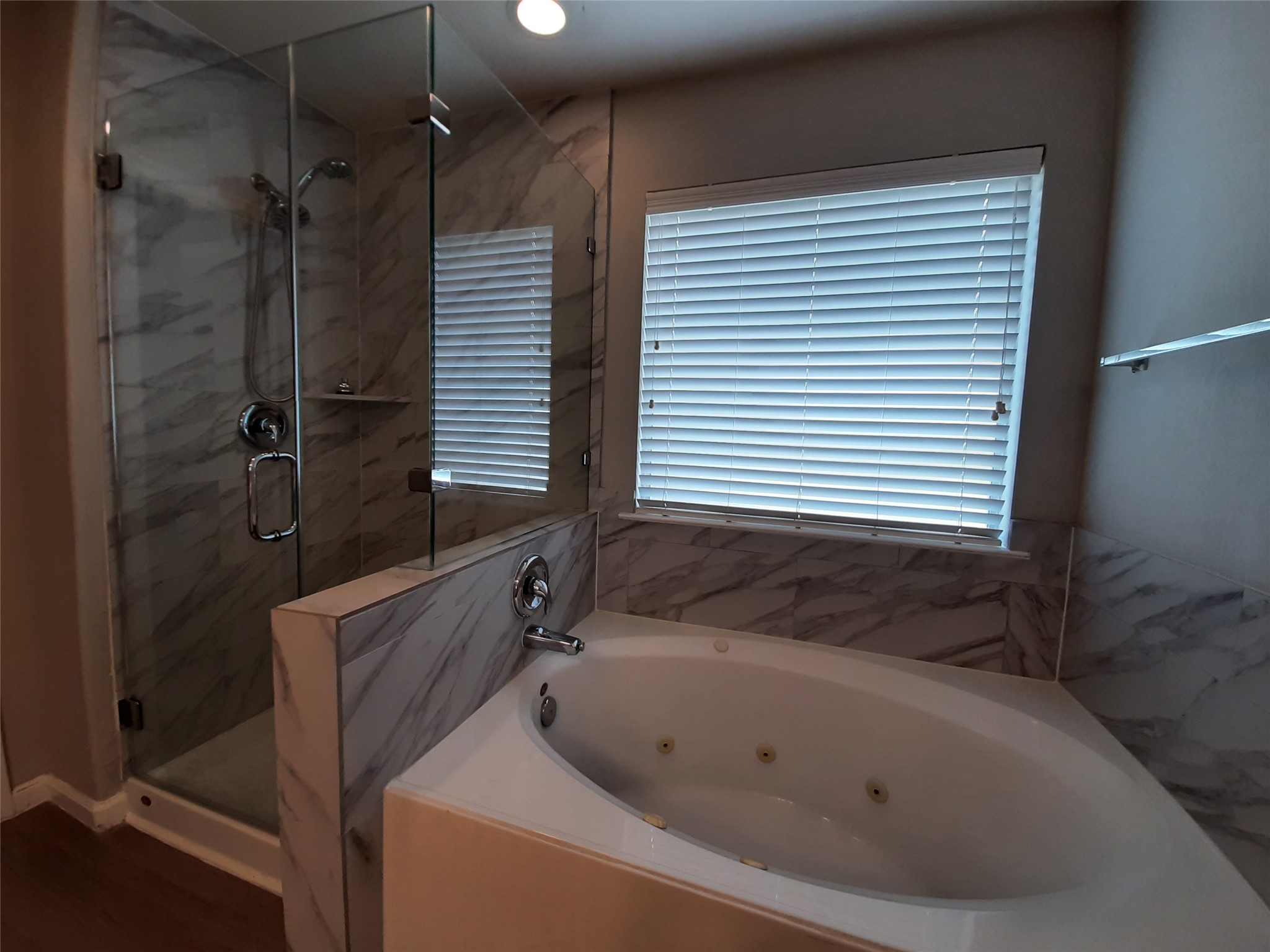 20526 Rustic Rail Court Cypress, TX 77433 - Photo 14 of 23 a bathroom with a bathtub and a shower