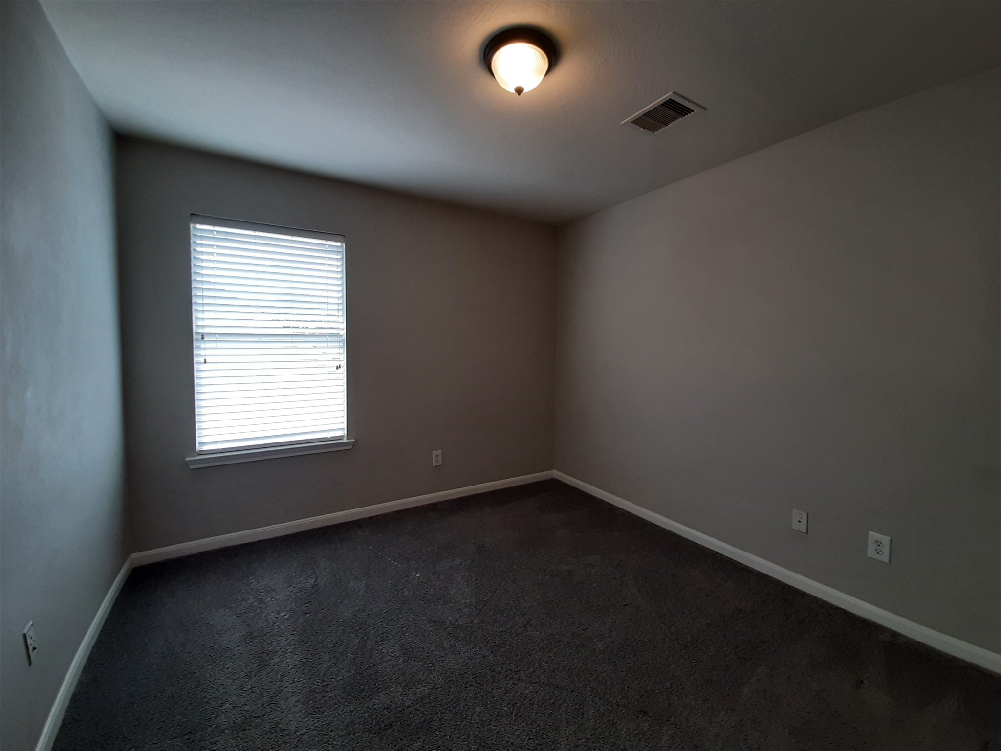 20526 Rustic Rail Court Cypress, TX 77433 - Photo 18 of 23 an empty room with a window