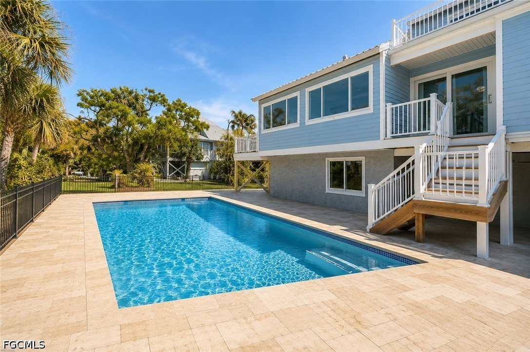 785 Rabbit Road Sanibel, FL 33957 - Photo 26 of 32 a view of swimming pool with outdoor seating