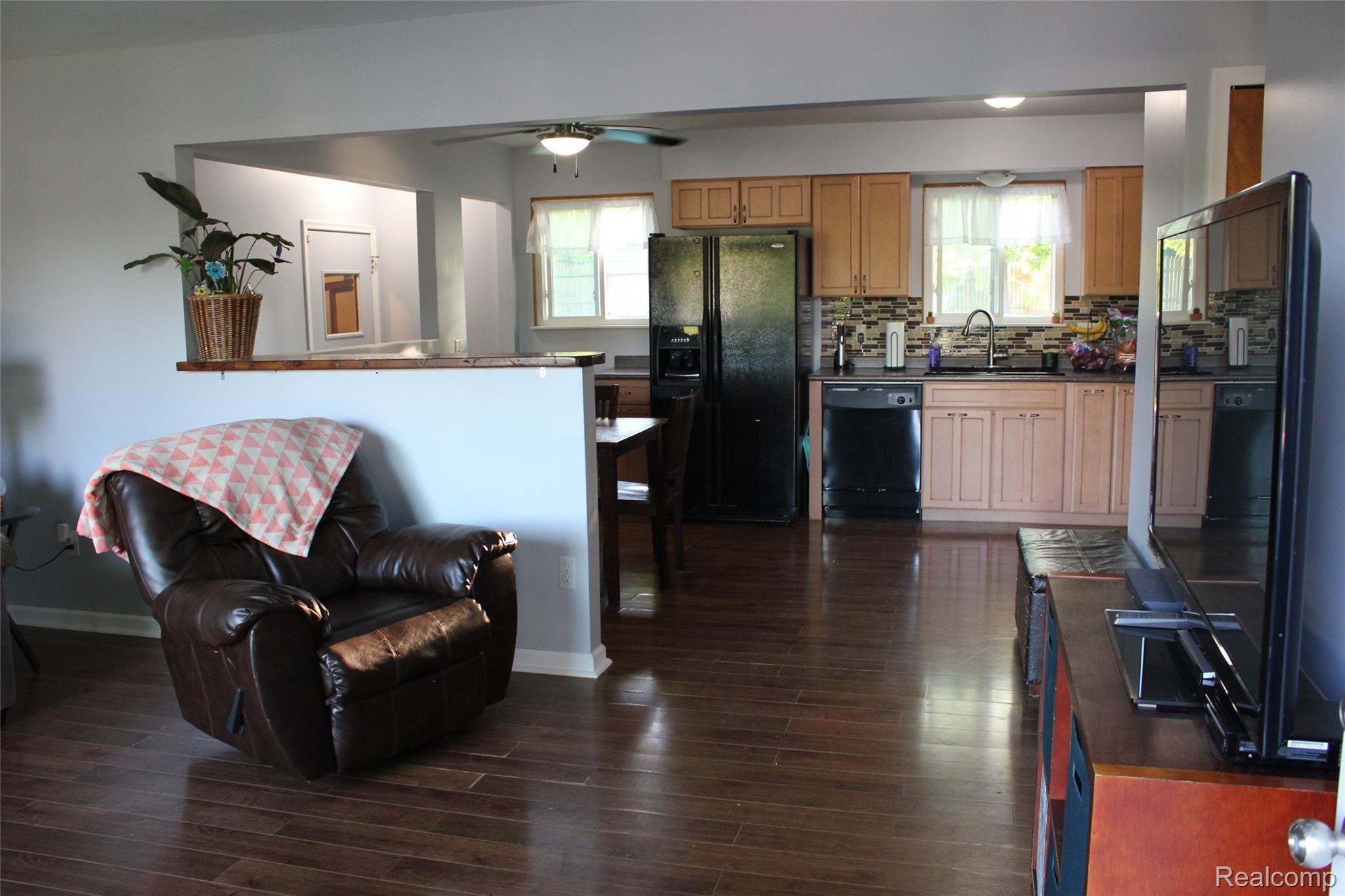 2158 Eberly Road Flint, MI 48532 - Photo 5 of 14 Living Room into Kitchen