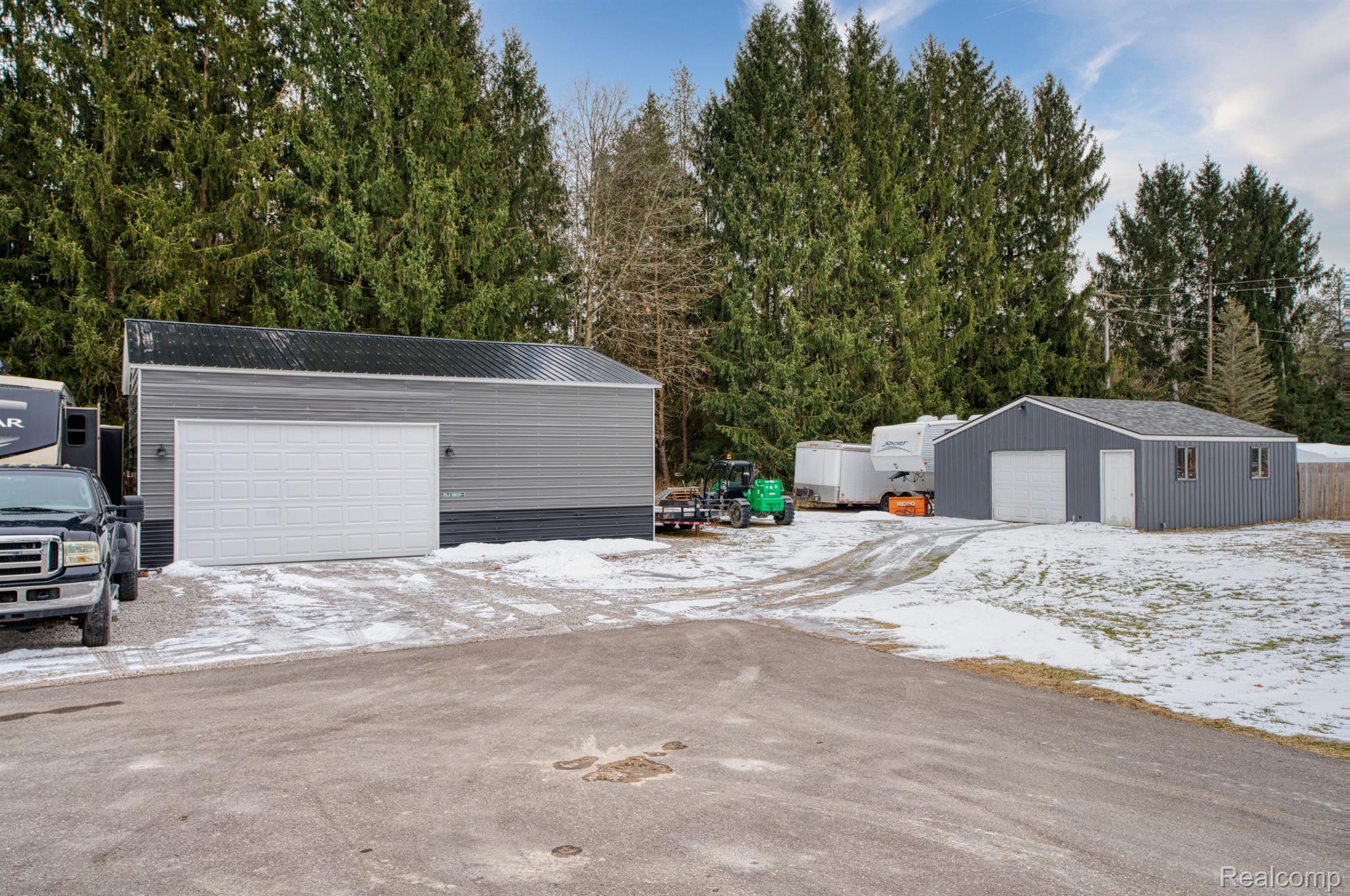 5217 South Bull Run Road Gregory, MI 48137 - Photo 24 of 27 35 X26 POLE BARN W/METAL ROOF and 24 X24 GARAGE