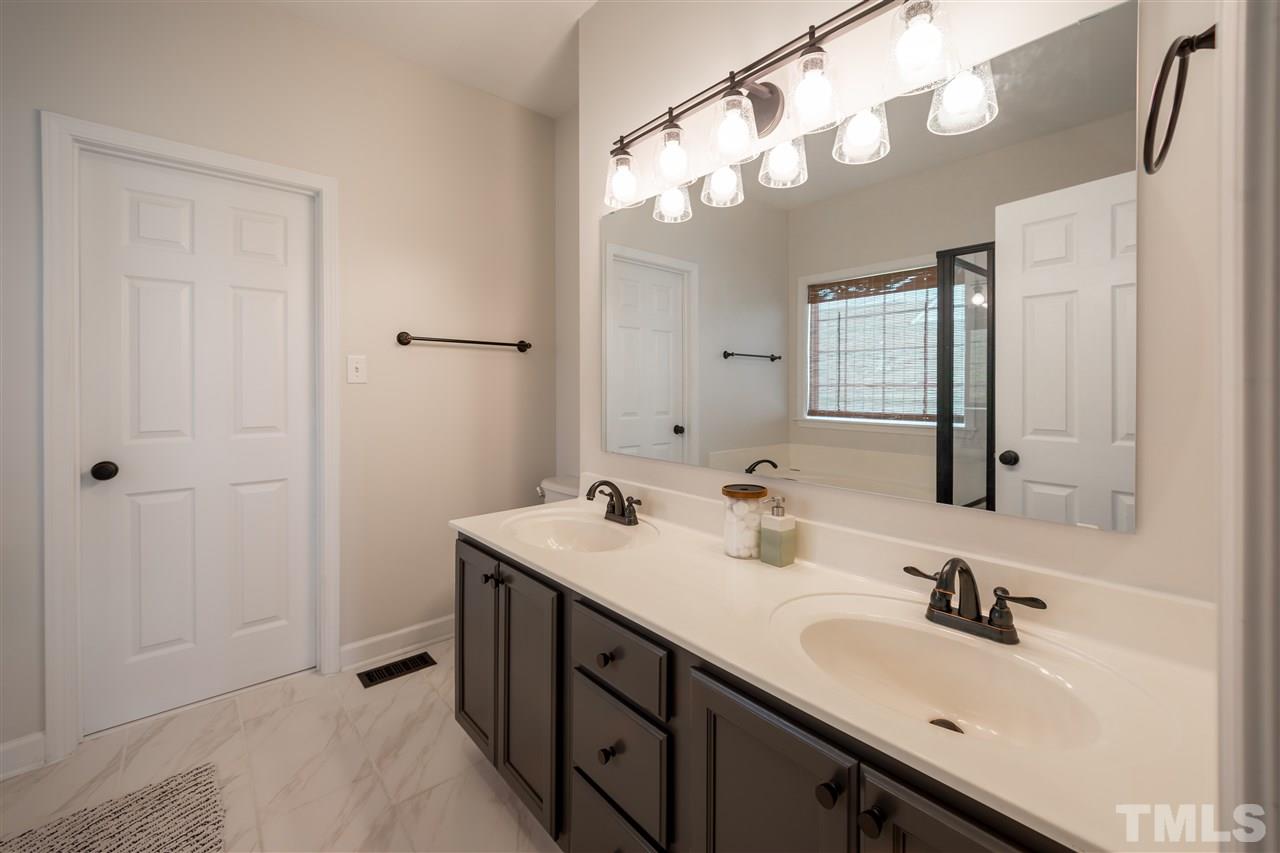 4425 Gallatree Lane Raleigh, NC 27616 - Photo 16 of 24 New plumbing and electric fixtures.