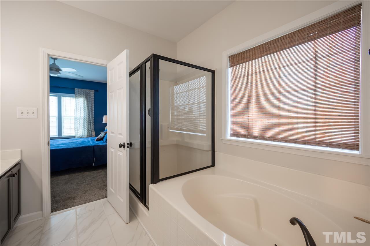 4425 Gallatree Lane Raleigh, NC 27616 - Photo 17 of 24 Separate walk-in shower and garden tub.