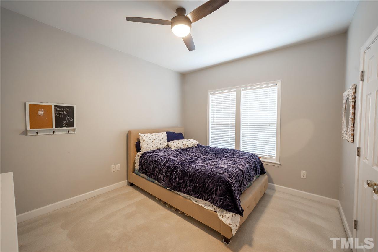 4425 Gallatree Lane Raleigh, NC 27616 - Photo 21 of 24 Large bedroom. Fresh paint and updated light fixture/fan.