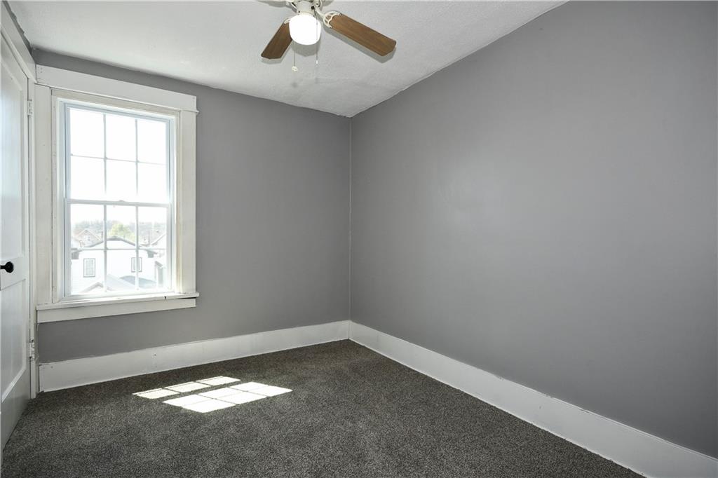 335 Mercer Street Turtle Creek, PA 15145 - Photo 16 of 25 an empty room with a window